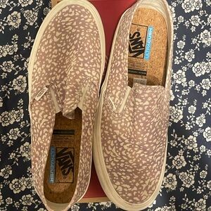 Vans pink animal print slip ons